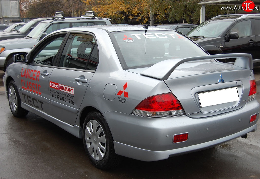 4 249 р. Накладка заднего бампера GT Dynamics Mitsubishi Lancer 9 2-ой рестайлинг седан (2005-2009) (Неокрашенная)  с доставкой в г. Тольятти