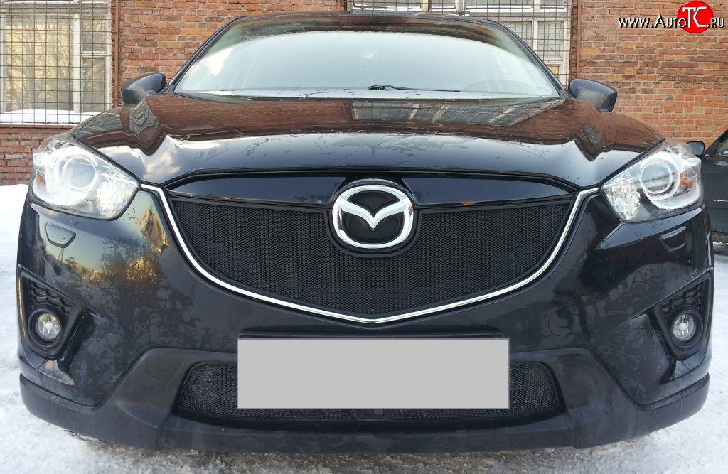 2 299 р. Нижняя сетка на бампер Russtal (черная) Mazda CX-5 KE дорестайлинг (2011-2014)  с доставкой в г. Тольятти