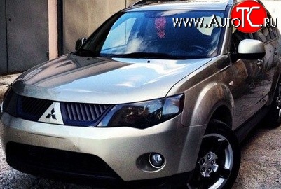 1 529 р. Темная защита передних фар SIM Mitsubishi Outlander XL (CW)  дорестайлинг (2005-2009)  с доставкой в г. Тольятти