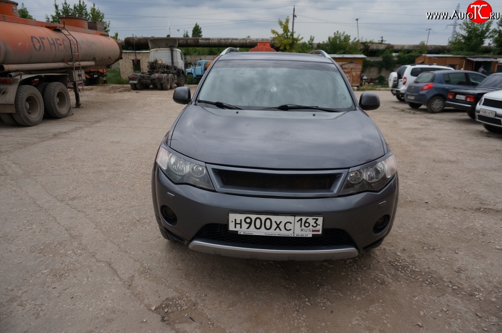 5 449 р. Решётка радиатора (рестайлинг) Sport Mitsubishi Outlander XL (CW)  рестайлинг (2010-2013) (Неокрашенная)  с доставкой в г. Тольятти